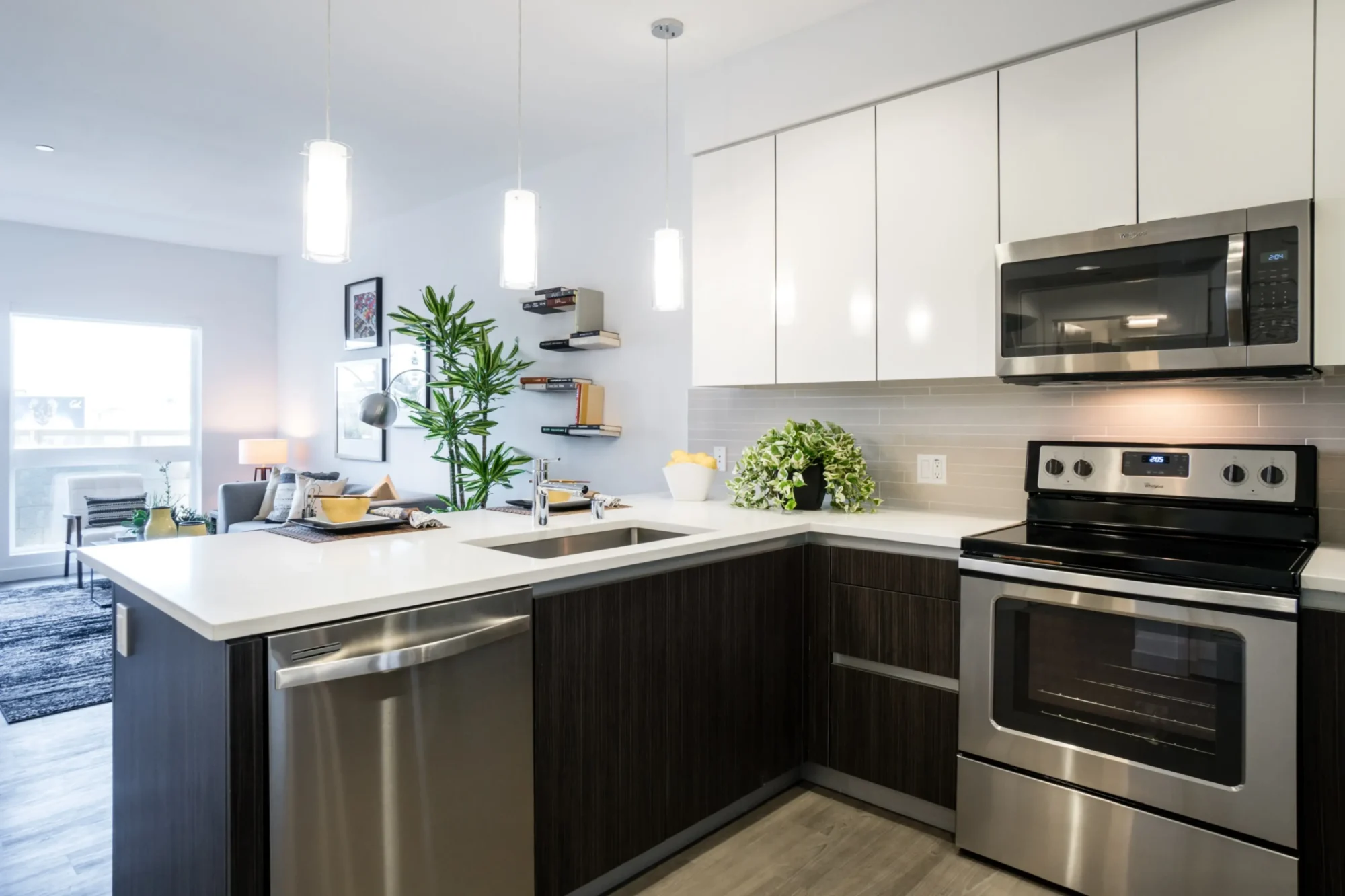 Kitchen with stainless appliances and tile backsplash